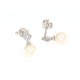 Eleganti orecchini in oro bianco con zirconi e perla