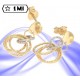 Eleganti orecchini anelli diamantati in oro giallo e oro bianco